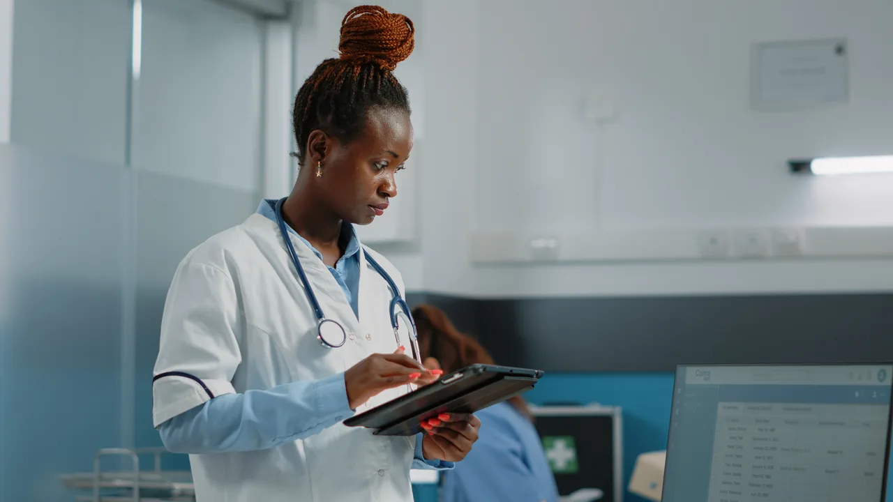 A clinician using IntelliBra technology